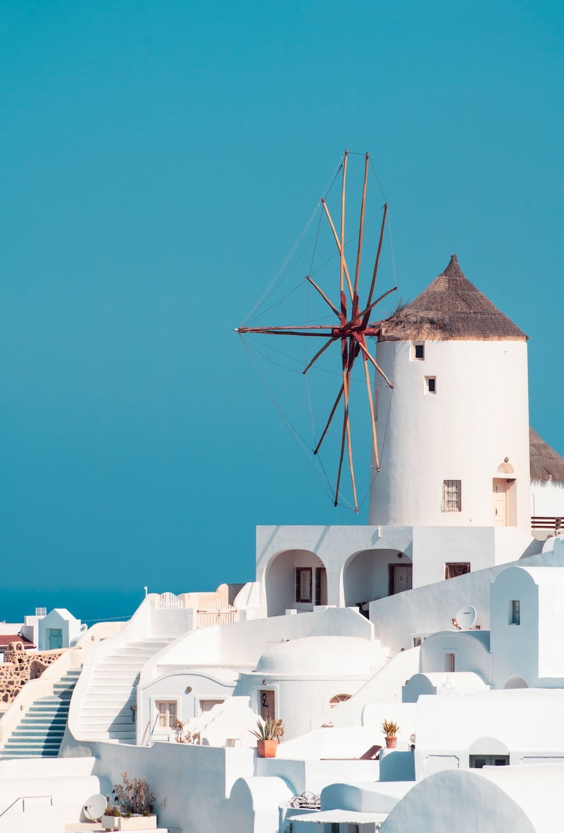 brown and white windmill in santorini